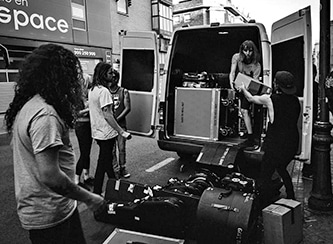 Band loading tour van